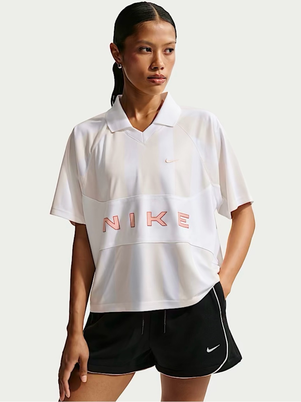 Nike Women's Oversized White Short-Sleeve Jersey with Pink Logo Size S